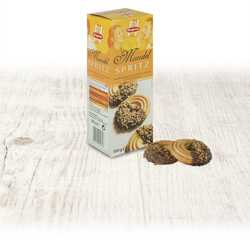 Mandel Spritzringe - Produkt von Borggreve - Spritzgebäck, Mandelkrokant, Spritzringe, Jahresgebäcke, Vollmilchglausur